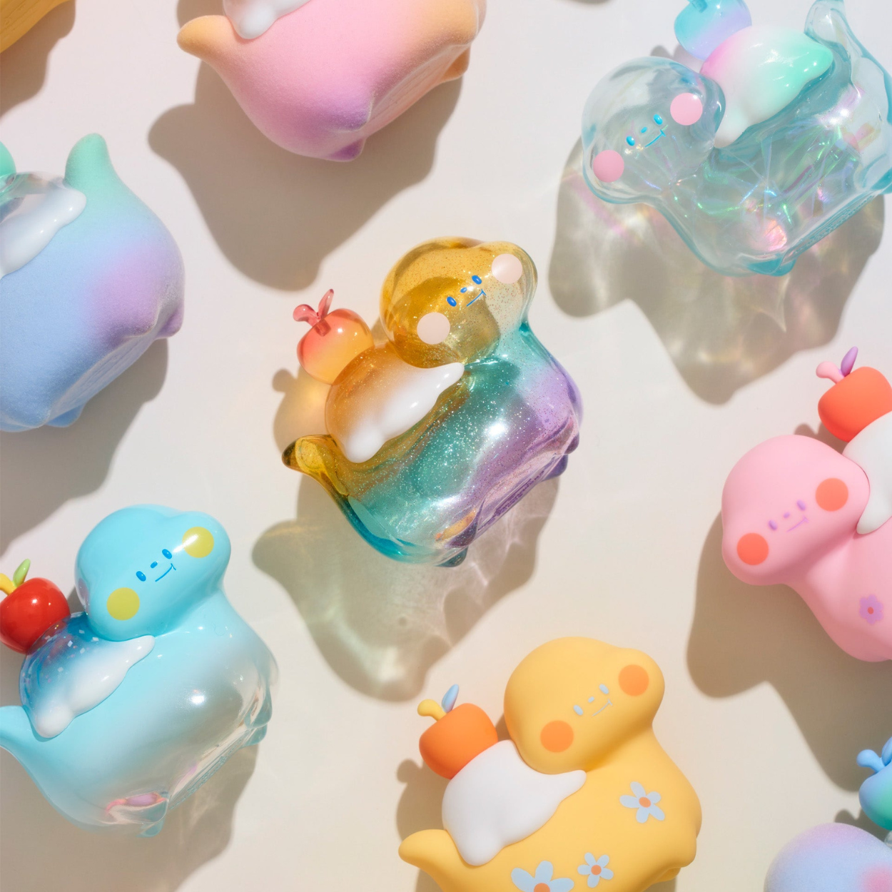 Colorful cartoon-like figurines on a light background