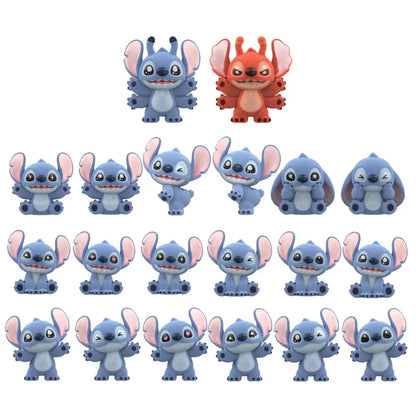 Collection of cartoon character figurines on a white background